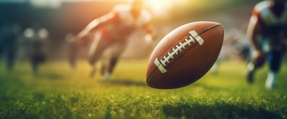 Wall Mural - American football ball on a stadium pitch