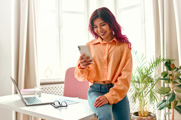 Wall Mural - Asian young woman at home