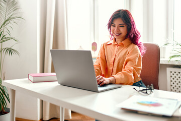 Wall Mural - Asian young woman at home