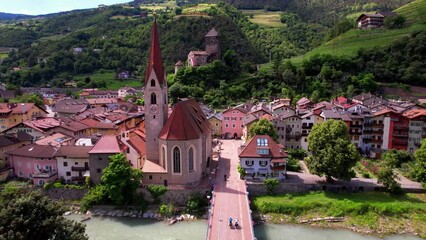 Wall Mural - Scenic beautiful places of northern Italy. Charming village Chiusa surrounded by Dolomites mountains. arerial view. Valle Isarco, in Trentino Alto Adige. Bolzano province