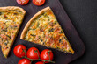 Delicious fresh quiche with broccoli, cheese, spices and herbs cut into pieces