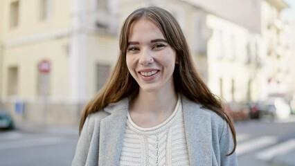 Poster - Young hispanic woman smiling confident at street