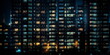 © Aleksandr - night city buildings windows with  blurred  light  and people siluetthe urban lifestyle