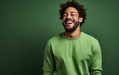 Ultra handsome man, smiling and laughing, wearing bright clothes. Bright solid green background. created by generative AI technology.