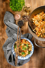 Canvas Print - Fried noodles with chicken and vegetables.