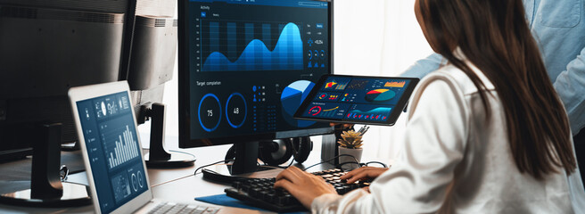 Poster - analyst working on data analysis or bi dashboard on computer monitor. business team analyzing financ