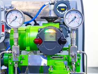 Poster - industrial gas equipment. green compressor with manometers. equipment for metering used gas. boiler 