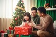 © Anatolii - A happy diverse Asian family celebrates Christmas