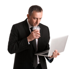 Poster - Mature businessman with laptop drinking fruit smoothie on white background