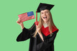 Female graduate student with USA flag on green background