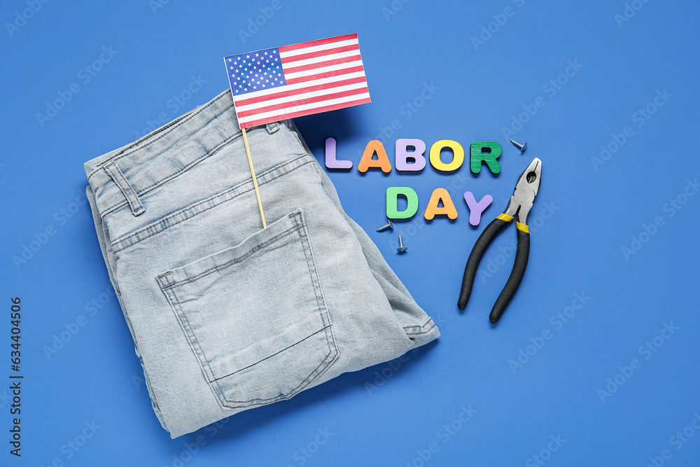 USA flag, jeans, pliers and text LABOR DAY on blue background