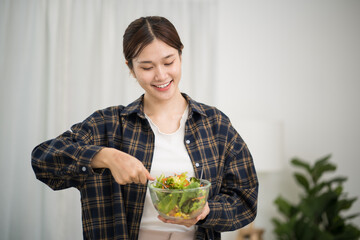 Asian woman dieting Weight loss eating fresh fresh homemade salad healthy eating concept