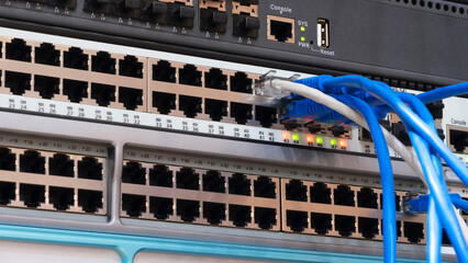 Poster - Multi Colored Network Cables Connected to Switch, network  technology concept