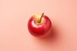 Delicious red apple on pastel background. Flat lay photo