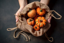 Female Hands Holding Pumpkins In A Jute Basket, Top View. Generative AI