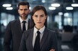 © Jorge Ferreiro - woman and man in business suit in office