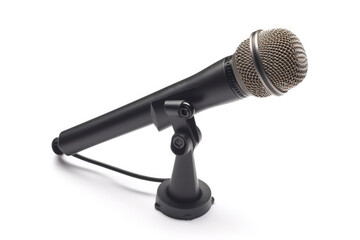 Wall Mural - A black ball-type microphone on a black desk stand with a flexible arm in a white background