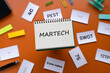 © hogehoge511 - There is notebook with the word MARTECH. It is as an eye-catching image.