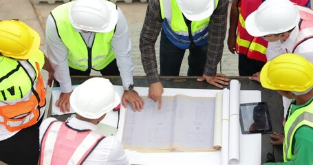 Sticker - Ethnic diversity worker people. Success teamwork. Group of professional Construction engineering people wearing hardhat safety helmet meeting at Prefabricated concrete walls Industry Manufacturing