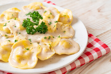 ravioli pasta with mushroom cream sauce and cheese