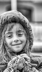 Sticker - Happy little girl at New Orleans carnival on Mardi gras major event