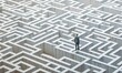 © jambulart - businessman in the middle of a maze