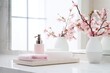 Cosmetic and beauty products for bath spa in white bottles, a branch of spring pink sakura flowers, toiletry on the table in soft light white bathroom interior in geometric simple urban. Generative AI