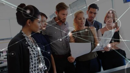 Poster - Animation of network of connections over diverse businesspeople discussing over documents at office