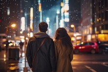 Rearview Multiethnic Couple Travelers Exploring City At Night