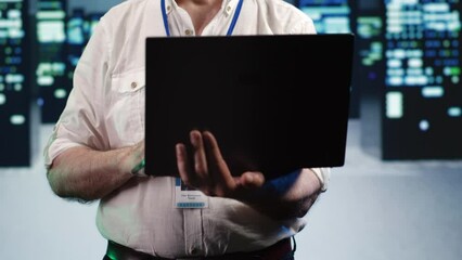 Poster - cloud computing business executive expertly managing data while navigating in industrial server room
