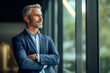 © AI_images - Happy proud prosperous mid aged mature professional business man ceo executive wearing suit standing in office arms crossed looking away thinking of success, leadership, side profile view