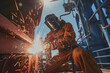 © SnapVault - A skilled specialized worker in welding is repairing metal structures on an offshore oil plant.