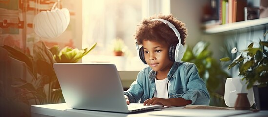 Poster - Biracial boy studying at home using technology for education