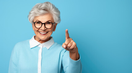 Wall Mural - Senior woman wearing casual clothes pointing with hand and finger to the side looking at the camera.