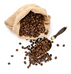 Wall Mural - Scoop of coffee beans and a bag with coffee beans isolated. Coffee in scoop. Top view of coffee.