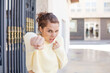 © kues1 - pretty young woman looking confident, angry, strong and aggressive, with fists ready to fight in boxing position