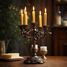 Antique Elegance: Bronze Candelabra With Lit Candles