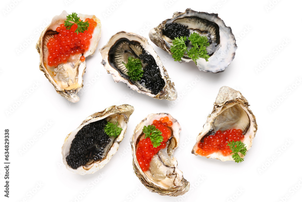 Tasty oysters with black and red caviar on white background