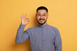 © Prostock-studio - Happy Young Asian Man Showing Ok Gesture At Camera