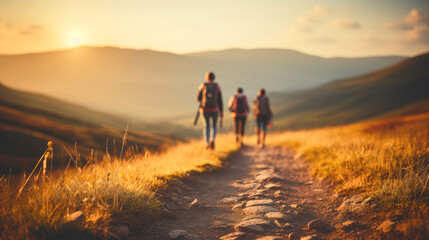 Wall Mural -  Selective focus of mountain landscape . group of people walking on the sunset