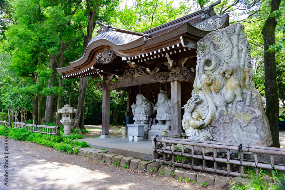 Japanese guardian statues at the traditional street in Tokyo wide shot