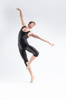 © danmorgan12 - Modern Ballet Dancing. Contemporary Art Ballet of Young Caucasian Athletic Man in Black Suit Dancing in Studio