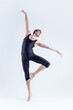 © danmorgan12 - Modern Dance Concepts. Contemporary Art Ballet With Young Handsome Caucasian Dancing Athletic Man in Black Suit In Studio On White