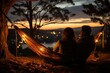 Couple lying on a hammock gazing at the stars - stock photography concepts