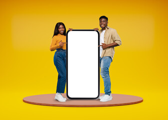 Poster - Mobile Offer. Cheerful Black Couple Pointing At Big Cellphone With White Screen