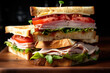 A perfectly stacked triple decker club sandwich filled with turkey, ham, cheese, and tomatoes, ready to be devoured, in a close-up view.