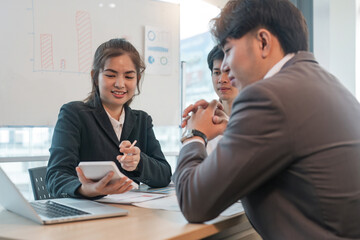 Sticker - Asian business team meeting to analyze and discuss the situation on the financial report in the meeting room. Investment Consultant, Financial advisor and accounting concept