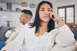 © Azee/peopleimages.com - Frustrated couple, fight and argument in divorce, conflict or disagreement on living room sofa at home. Unhappy man and woman in breakup, cheating affair or dispute from toxic relationship in house