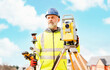© Iryna - Surveyor builder site engineer with theodolite total station at construction site outdoors during surveying work