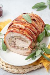 Wall Mural - Pork Loin Roll Stuffed with sausage, Apples, Walnuts and Herbs